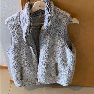 Women’s fuzzy vest.